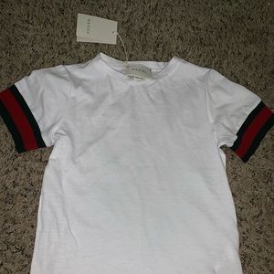 White Gucci T-shirt.